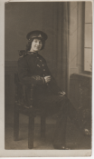 Photograph of Gladys, a teenage girl, dressed in the uniform of the Royal Artillery, c.1914